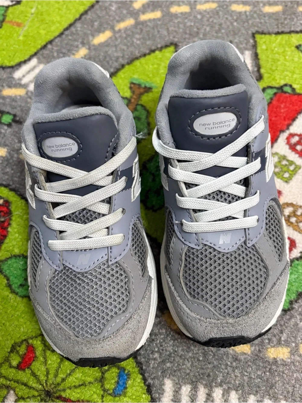 New Balance Kids Gray and White Sneakers